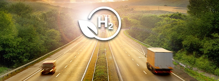 Hydrogen sustainability icon over highway landscape